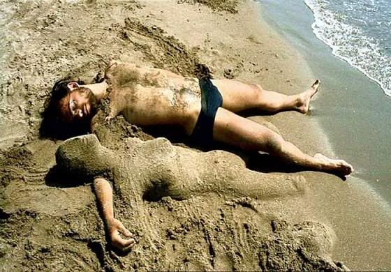 mulheres,praia,areia
