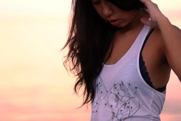White tank with art by Gabriell...